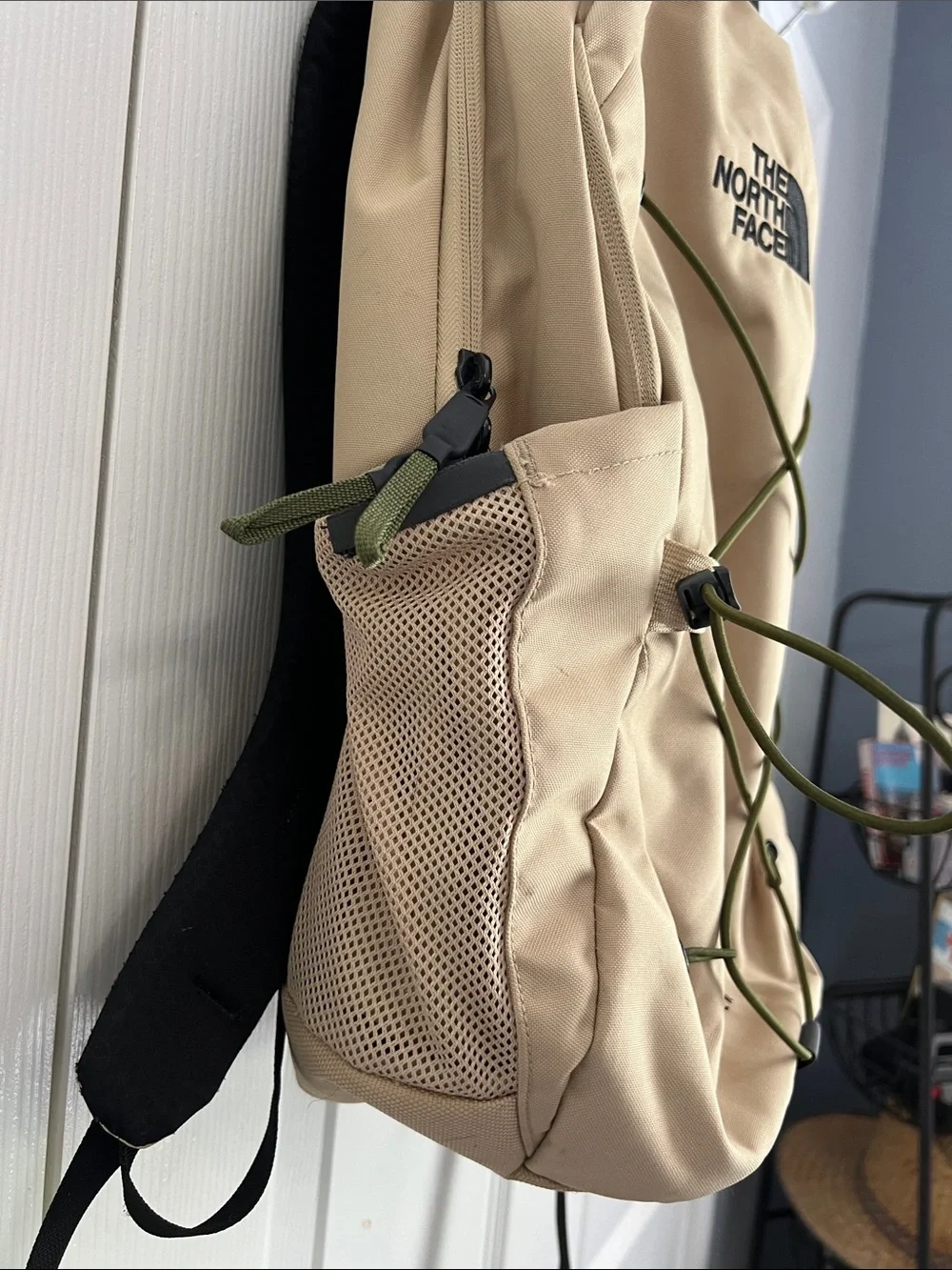 The North Face Jester Backpack in Beige with Olive Bungee